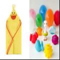  Win een prachtige gele baby cape en een set water speeltjes van Sophie de Giraf.